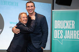 Winfried Rothermel (abcdruck) und Laudator Wladimir Klitschko